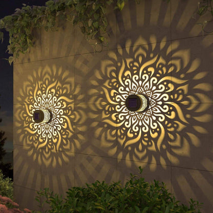 Décoration solaire extérieure motif tournesol en métal ajouré avec projection lumineuse
