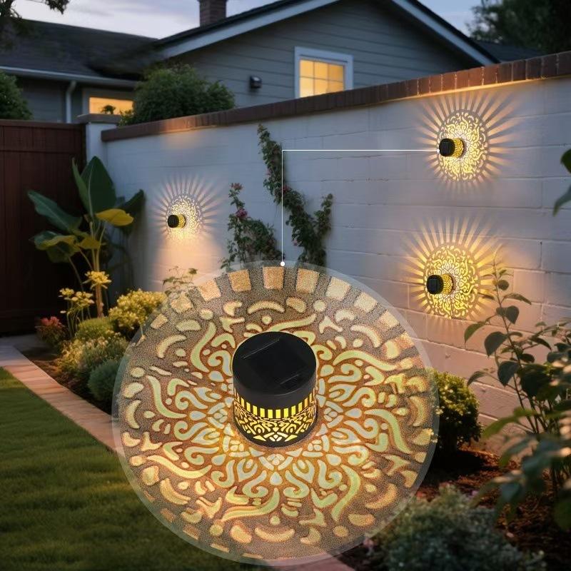 Décoration solaire extérieure motif tournesol en métal ajouré avec projection lumineuse